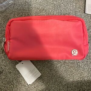 Brand new lululemon everywhere belt bag in coral